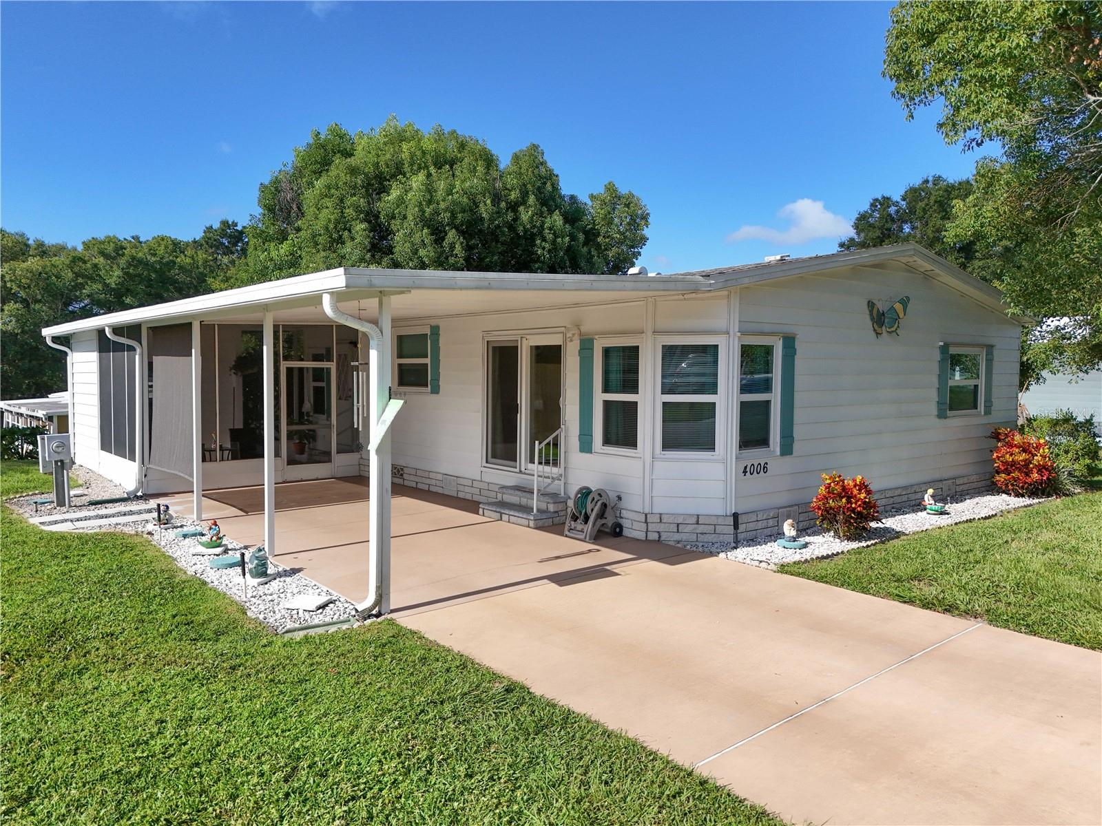 Welcome to this charming 2-bedroom, 2-bath manufactured home nestled in the desirable Zellwood Station community! This quaint residence has been thoughtfully updated with new windows, new laminate flooring, and freshly cleaned carpets, ensuring it’s move-in ready for its next owner.
Zellwood Station is a vibrant, resident-owned 55+ community offering an array of amenities to enhance your lifestyle:
• 72-par Championship Golf Course: Enjoy unlimited golf on the beautifully maintained course.
• Community Clubhouse: A hub for social gatherings and events.
• Swimming Pool & Spa: Relax and unwind in the community pool and spa.
• Fitness Center & Sauna: Stay active and healthy with on-site fitness facilities.
• Tennis, Pickleball, and Shuffleboard Courts: Engage in friendly competition with various sports options.
• Bocce Ball & Horseshoes: Enjoy classic games with neighbors and friends.
• Library & Billiard Room: Perfect for quiet reading or a game of pool.
• Walking Trails & Community Park: Explore the scenic surroundings and green spaces.
• Boat/RV Storage: Convenient storage options for your recreational vehicles.
• On-Site Restaurant and Lounge (“The Whistle Stop”): Dine and socialize without leaving the community.
Beyond the community’s offerings, this home is conveniently located near FL-429, providing easy access to Orlando, Apopka, and Mount Dora, where you’ll find shopping, dining, and entertainment options.
This home combines updated comfort with a vibrant community lifestyle. Don’t miss the opportunity to make it yours!