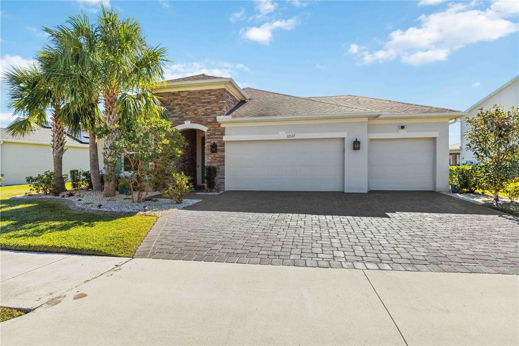 Photo of 12537 Ryegrass Loop, Parrish, FL 34219 (MLS # A4677454)