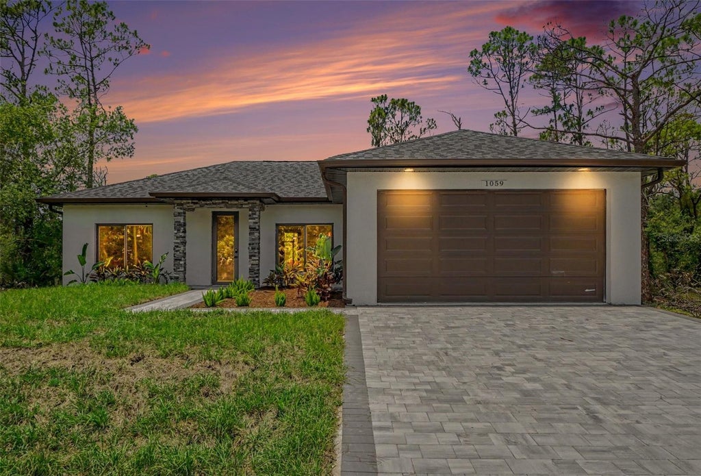 Photo of 1059 Madeira Street, Port Charlotte, FL 33953 (MLS # TB8526178)
