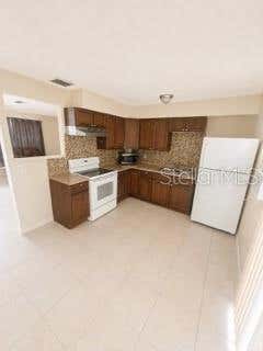 Photo of 729 Lotus Lane, Daytona Beach, FL 32114 (MLS # O6436964)