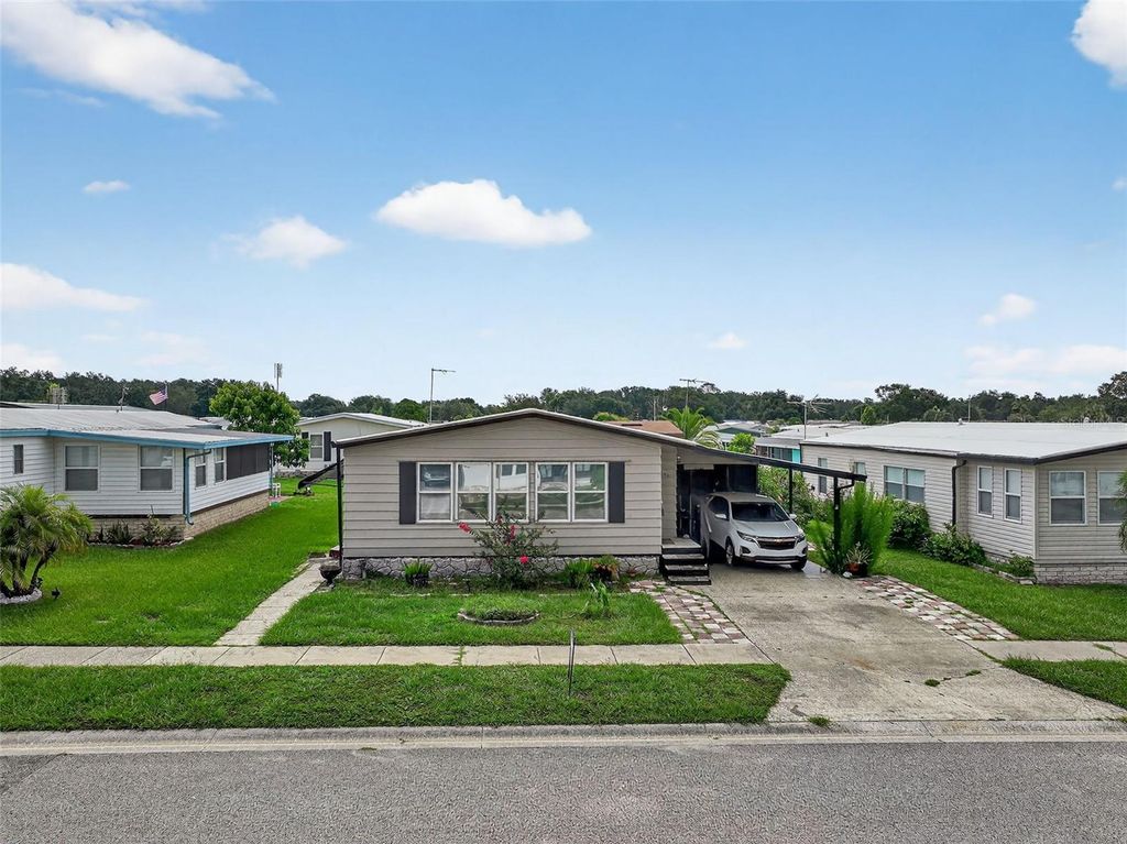 Photo of 3850 Sarah Drive, Wesley Chapel, FL 33543 (MLS # TB8403072)