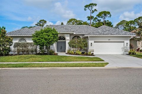 Photo of 629 Sawgrass Bridge Road, Venice, FL 34292 (MLS # A4692672)