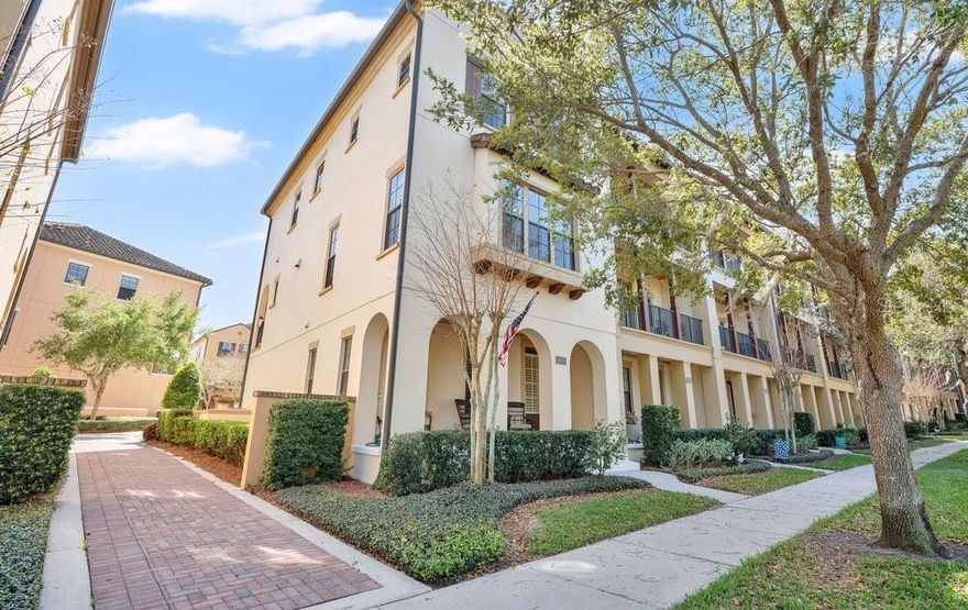 Experience one of Baldwin Park’s most desirable settings with direct views of Blue Jacket Park from this rarely available Milano floor plan. This 3-story, 3-bedroom, 3.5-bath corner townhome offers 2,258 heated square feet (2,918 total) of thoughtfully designed living space, blending functionality, natural light, and a truly turnkey lifestyle.
As a corner unit, this home is filled with natural light, featuring double-pane, energy-efficient windows not only at the front and back, but also along the entire side—an uncommon advantage that creates a bright, open feel throughout.
The first floor features a rear-entry 2-car garage, a versatile flex space that can easily serve as a home office, guest room, or additional living area, and a full bath.
Upstairs, the main living level is designed for both everyday living and entertaining, enhanced by 10-foot ceilings that create an open, airy feel. The spacious kitchen is centered around a large island with a built-in sink, offering ample prep space and a natural gathering point. It flows seamlessly into the dining area and family room, where a large window feature provides a unique, inviting focal point and captures the park views. A private balcony extends the living space outdoors, while a half bath on this level adds convenience for guests.
The third level hosts all three bedrooms, including the Owner’s Retreat with 10-foot ceilings, a walk-in closet, and an en-suite bath. Two additional bedrooms are connected by a shared bath, and a conveniently located washer and dryer complete the level, enhancing everyday functionality.
The home is enhanced with California Closets in most closets, adding both organization and a touch of luxury, while the durable concrete roof offers long-term peace of mind. The HOA covers exterior painting, roof maintenance, landscaping, pressure washing, and overall exterior upkeep—delivering a truly low-maintenance, turnkey lifestyle.
The location is exceptional, set directly across from Blue Jacket Park, where you’ll enjoy access to an outdoor calisthenics gym, basketball and tennis courts, and a scenic walking loop right nearby. With Baldwin Park’s walkable layout, nearby dining, and close proximity to Winter Park, this home offers the perfect balance of lifestyle, convenience, and comfort.