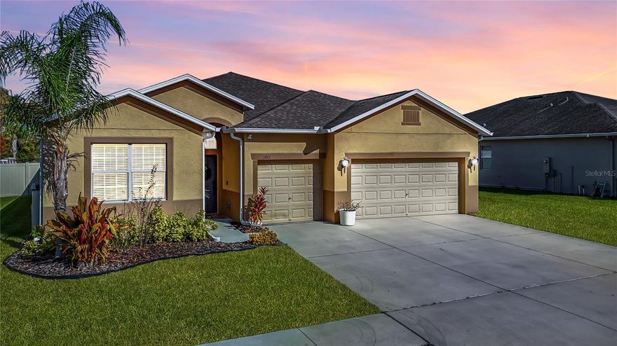 LIVE THE LIFESTYLE you’ve been searching for in this thoughtfully designed 4bed, 3bath, 3-car garage home in Lakeside Hudson, where an open, sunlit layout creates an easy, elevated rhythm to everyday living! At the heart of the home, the kitchen truly stands out - beautifully finished with granite surfaces, an oversized island, and a breakfast bar that naturally draws everyone in, making it just as perfect for weekday meals as it is for hosting. The kitchen also has a new refrigerator and dishwasher! The primary suite offers its own sense of escape with a relaxing garden tub, separate walk-in shower, and dual granite vanities that bring a touch of spa-like comfort to your daily routine. Outside, the experience continues with a PRIVATE SCREENED-IN POOL with brand new pool pump, featuring a wide sun shelf, refined tile accents, and a generous covered lanai overlooking the fully fenced backyard, an inviting setting for quiet mornings, open-air dining in the sunken outdoor kitchen with gas-grill, or evening unwinding. Ceramic tile flooring in the main living areas and soft carpeting in the bedrooms pair style with comfort throughout. Other new appliances include a dryer and water softener. As a resident of Lakeside, you’ll enjoy a host of resort-inspired amenities including a sparkling community pool, tennis and basketball courts, a playground, and a clubhouse designed for gathering and connection. If you’re looking for a home that elevates everyday living, this one is ready to experience. Schedule a private showing today! 
*** Age of Roof - 2017, Age of A/C - 2017, Age of Water Heater - 2017.