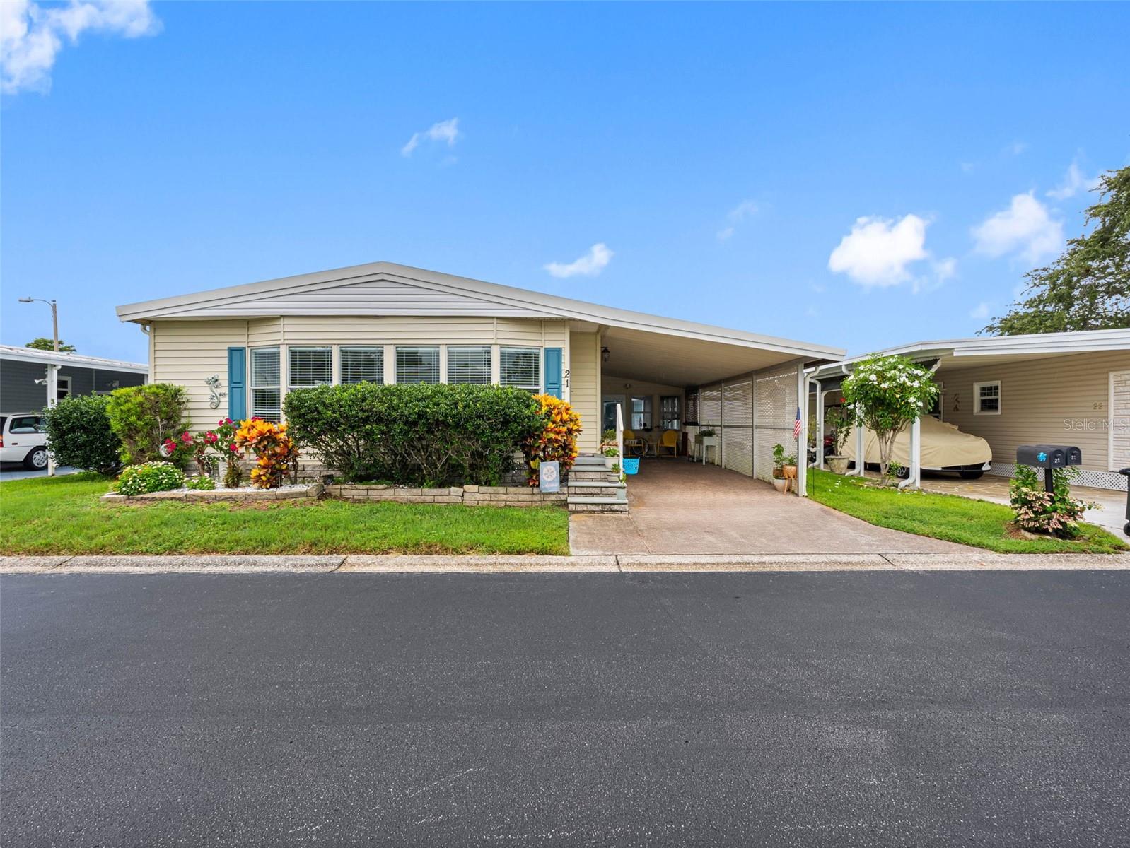 Step into the Florida lifestyle you've been dreaming of—where every day feels like a resort getaway. Located in the sought-after resident-owned 55+ community of Glenwood Estates, this beautifully updated and exceptionally maintained 2-bedroom, 2-bath home offers nearly 1,530 square feet of bright, open living space, along with a long list of high-end improvements and a location that puts you right in the heart of the action.
Built in 1983 and not located in a flood zone, this home remained completely untouched by recent storms—built solid and continually upgraded for peace of mind. Major big ticket updates include a brand-new roof (2024), hot water heater 2024, a top-tier 4-ton Rheem HVAC system with UV air purification (2023), new luxury vinyl plank flooring, and a new stove. The original polybutylene plumbing has been replaced, and the interior has been freshly painted throughout.
The coastal-inspired kitchen is the heart of the home, featuring custom cabinetry, stone countertops, a new stove, and a cozy eat-in area perfect for casual dining. The open floor plan flows easily into the spacious great room, ideal for entertaining. The primary suite includes a beautifully renovated bath with dual sinks, stone countertops, a tiled walk-in shower, and a separate commode area. An oversized indoor laundry room with a built-in workspace, a large storage room, and a 1-car carport add everyday convenience. You’ll also enjoy a screened outdoor lanai—perfect for relaxing—and a paver patio overlooking the lake, just a short stroll to the pool and community amenities.
Glenwood Estates truly feels like a Disney for adults. Residents enjoy a sparkling lake with a fishing pier, a lakeside pavilion and BBQ area, horseshoe courts, indoor and outdoor shuffleboard, and a heated pool. The large clubhouse includes a full kitchen, billiards, a library, a craft room, and plenty of space for daily social events, hobby groups, and activities. The beautifully manicured grounds offer the ideal setting for an active, social lifestyle in a close-knit community. The low $320/month condo fee includes internet, cable, water, sewer, lawn care, pest control and twice-weekly trash pickup.
What truly sets Glenwood Estates apart is that it’s one of the few 55+ communities in the area where you own the land outright and can secure traditional financing—no land lease, no co-op complications. Located less than 5 miles from Indian Rocks Beach and close to shopping, restaurants, golf courses, and both Clearwater-St. Pete and Tampa International Airports, this is Florida living at its finest. Furniture is not included, allowing you to bring your own personal style and make this stunning home your own. Come see why life at Glenwood Estates is truly a celebration of everything 55+ living should be.