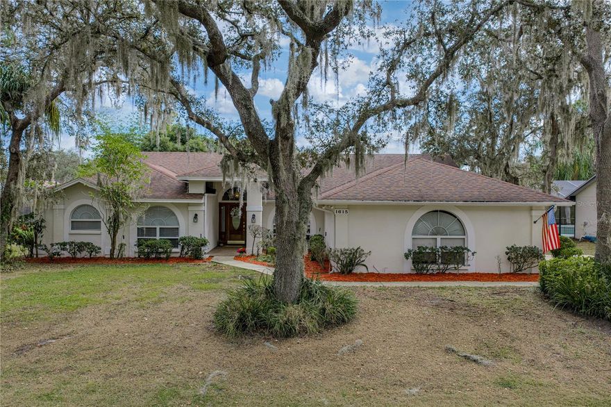 Seller to credit buyer $1500 at closing to update floors however you desire! Welcome to your dream home in the highly sought-after Buckingham neighborhood of North Lakeland! The Buckingham community offers easy access to shopping, dining, schools, and major highways while maintaining a peaceful neighborhood feel and includes access to a private boat ramp in the neighborhood. This spacious 4-bedroom, 2.5-bath residence offers over 2,500 sq. ft. of living space designed for both comfort and entertaining. As you drive down the long driveway, you enter the large side entry garage to your new home. Step inside and find the wide open and split bedroom floor plan just waiting for you to make it your own. Immediately you notice the abundance of natural light shining throughout. This split floor plan is ideal for both privacy and convenience hosting the primary bedroom and one guest room or office on one side and two additional bedrooms on the other side of the home. Located at the heart of the home, you will find the chef's kitchen. The counter space is perfect for hosting friends of family at every holiday or to house all of your kitchen gadgets. You can also enjoy the breakfast nook in the kitchen area to have a close gathering or to enjoy your coffee in the morning. Located right above the sink is a window allowing you to enjoy the Florida sunshine year long and watch the birds in the backyard. The kitchen beautifully opens to the warm living room featuring a charming fireplace. The guest rooms are the perfect size for family and guests alike situated in-between; you will find one of the guest bathrooms. Step outside to your private retreat featuring a sparkling pool with elegant pavers and screened lanai, ideal for relaxing or entertaining. With no rear neighbors, you’ll enjoy serene views and ultimate privacy and for added convenience, you will find the half guest bath located outside at the pool. You will also notice the mature landscaping and fruit trees to enjoy year-round. This North Lakeland gem combines style, functionality, and privacy—ready for you to move in and start making memories! Call today for your private showing before this beautiful home becomes someone else's dream come true!