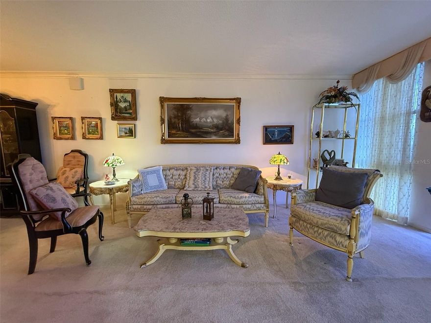 Resort-style living in a gated 55+ community on Boca Ciega Bay! This fully furnished 2BR/2BA condo (2nd bedroom converted to a den with sleeper sofa) is filled with antiques and collectables, featuring floor-to-ceiling windows with panoramic water views and abundant natural light. Community amenities include 6 pools, spa, tennis, pickleball, shuffleboard, marina, clubhouse, fitness center, and a 1.5-mile waterfront walking path. Laundry available on-site or in-unit. Covered parking included. Just minutes to St. Pete Beach, downtown St. Pete, dining, shopping, and cultural venues. Pet friendly.