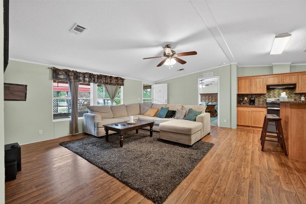 Photo of 163 West Street, Oak Hill, FL 32759 (MLS # V4948669)