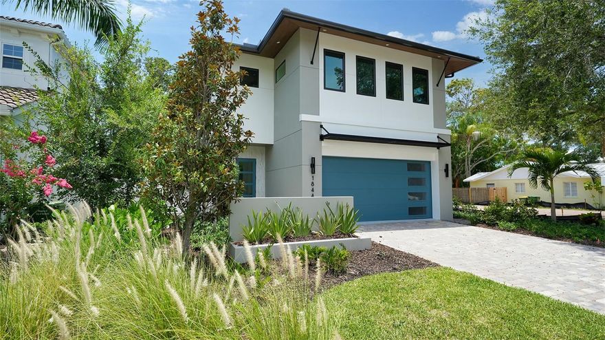 Recently Completed and Move in Ready! - 1844 Magnolia Street brings modern style and luxury to another excellent West of the Trail location. Majestik Homes defines the best of Sarasota's work and play lifestyle. Located just minutes from downtown and top ranked Siesta Beach, this 4 bedroom 3.5 full bathroom modern home is loaded with luxury finishes, hurricane impact windows and hurricane ready construction. Built by Majestik Homes and Designed by Award winning DSDG Architects. Enter the front door into a jaw dropping open concept floorplan, with polished concrete floors sparkling against the backdrop of a lushly landscaped pool area with expansive seating and entertaining space. The show-stopping gourmet kitchen boasts Stainless Steel appliances, modern cabinets and a 5-person waterfall edge island. Step out through the sliding doors of your Master bedroom on to your second story balcony to enjoy balmy evenings or watch the fun in the pool. Modern Style and generous spaces leave nothing to be desired at 1844 Magnolia.