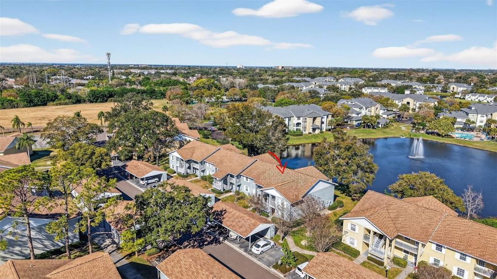 Photo of 1438 Millstream Lane #105, Dunedin, FL 34698 (MLS # TB8467857)