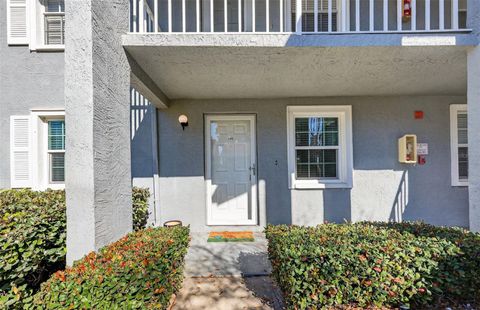 Photo of 1438 Millstream Lane #105, Dunedin, FL 34698 (MLS # TB8467857)