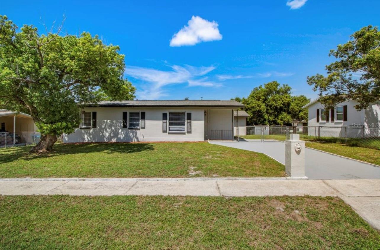 **This house comes with a REDUCED RATE through the seller's preferred lender. This is a lender-paid rate buydown that reduces the buyer's interest rate and monthly payment.** Step into stylish comfort with this beautifully renovated 3-bedroom, 2-bathroom single-family home nestled in a quiet Deltona neighborhood. From the moment you walk through the door, you’ll feel at home thanks to the bright, open floor plan, new laminate flooring throughout, and elegant crown molding that adds a touch of sophistication. The spacious living and dining area flows seamlessly into a charming kitchen, complete with crisp white cabinetry and matching white appliances. Just off the kitchen, a convenient laundry room with washer/dryer hookups keeps chores simple and out of sight. Need extra space? The bonus room is a blank canvas perfect for a home office, cozy den, or personal library—you decide! On the left side of the home, a private hallway leads to two bedrooms that share a stylish Jack and Jill bathroom, featuring pocket doors and a floor-to-ceiling tiled walk-in shower. The primary suite includes an ensuite bathroom with a relaxing tub/shower combo and a built-in closet. Step outside to your fully fenced backyard, a true blank slate ready for your dream garden, outdoor entertaining area, or play space. A handy shed adds extra storage just steps from the back door. This charming home blends comfort, style, and flexibility—all that's missing is you. Schedule your private tour today!