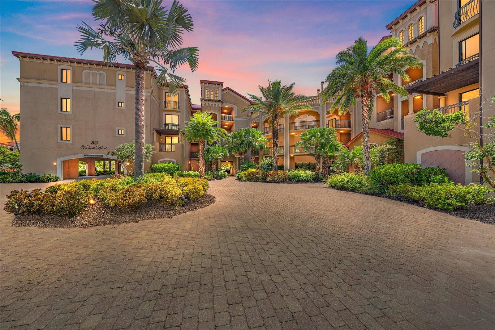 This elegantly upgraded 2-bedroom, 2-bathroom condominium in the highly desirable gated waterfront community of Vivante at Punta Gorda Isles. Located on the second floor, this residence showcases a thoughtfully designed open layout with premium enhancements throughout, offering both style and peace of mind. The kitchen has been fully updated with KitchenAid stainless steel appliances installed in 2021, including a counter-depth refrigerator with water and ice dispenser, a convection microwave with sensor cooking, a slide-in electric range with self-cleaning convection features, and a quiet top-control dishwasher with a stainless steel tub and third rack. A new garbage disposal and a high-end Brizo Litze high-arch stainless steel faucet with built-in spray complete this well-appointed space. The home features all-new LED lighting throughout, including a Modern Forms Acropolis LED linear suspension chandelier in natural alabaster and stainless steel, hi-hats, utility room lighting (4000K), bathroom vanity fixtures, and a lanai wall fixture. Modern Forms smart ceiling fans with integrated LED lighting have been installed in all rooms and the lanai and are compatible with smart home technology, allowing remote and app control. Additional upgrades include new Electrolux washer and dryer, a wine cooler, new screwless décor-style wall switches, receptacles and plates, all-new door hardware including stainless steel hinges and lever handles, and new double roller window treatments throughout. Both bathrooms feature new WAC Repose vanity fixtures, Brizo Vettis widespread faucets, soft-close American Standard toilet seats, and pivot double-post toilet paper holders. The entire unit has been freshly painted, creating a clean and modern aesthetic.
The HVAC system was replaced in January 2018, and the water heater was replaced in October 2019, adding to the value and reliability of this well-maintained home. This unit also has a storage unit on the 1st floor and 1 assigned parking spot. Vivante offers a luxury lifestyle with world-class amenities including a grand clubhouse, two resort-style pools (one of which is a lap pool), a fitness center, spa services, tennis courts, and walking trails. Conveniently located near Fishermen’s Village, Charlotte Harbor, public boat launch, and downtown Punta Gorda, this condominium presents a rare opportunity to own in one of Southwest Florida’s premier maintenance-free waterfront communities.
