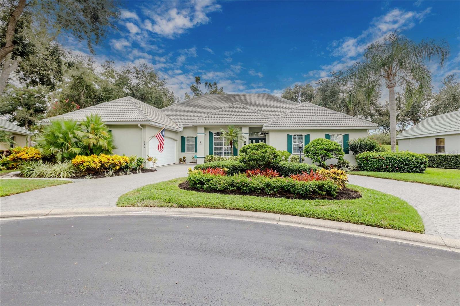 Elegant Florida Living in a Private Gated Golf Community. Nestled at the end of a peaceful cul-de-sac in The Reserve, one of Venice’s most beautiful sought after gated golf course communities. This beautifully maintained home offers the perfect balance of refined living, modern upgrades, and effortless comfort. The property provides rare privacy, elevated design, and peace of mind — ideal for those who expect more from their home.
From the moment you arrive, you're greeted by a custom paver circular driveway—reset, stained, and sealed in 2022 for a polished first impression. In 2024, the community roads were fully redone and sealed, and in 2021, a hurricane-rated garage door was installed to meet today’s highest standards of safety and design. New tile roof installed January of 2025 in neutral gray shade to match the paver brick driveway.
This elevated lot was thoughtfully built up at the time of construction for superior flood protection and drainage, while a well-fed irrigation system keeps the lush landscape vibrant. The left corner of the lot was thoughtfully planted with native Florida vegetation, enhancing both privacy and ecological integrity. It provides a large side yard full of shade, beauty and privacy. It’s rare to find a home with both a golf course view and a large private yard.
Inside, every detail was thought out with both quality and intention. High tray ceilings throughout, coffered ceiling in the den, crown molding, several walk in closets, and built-in features and storage will show that this home is truly one of a kind. Custom built-in window seating in the kitchen offers convenient places to tuck away pool towels or holiday decor. Built in entertainment center in family room features an 80-inch tv, magnetic panels that lift away to hide wires and connected devices, as well as storage and display options. There is an additional storage closet on lanai as well as three closets in garage to keep all of your work and play items organized and away when not in use.
The primary suite bathroom was fully redesigned in late 2021, featuring a custom built double vanity with quartz countertops, elegant basin sinks, fountain-style faucets, and a built-in seated vanity area—perfect for a tranquil start to your day.
Wide plank wood-style tile flooring (2020) flows through the kitchen, great room, and laundry, adding warmth and cohesion to the living spaces. The den features brand-new tile 2025, while the primary bedroom carpet was just updated in 2025 as well.
Additional features include a Moen smart water detection system, newer water heater, large A/C unit (5 years old), and all appliances replaced within the past 5 years, ensuring efficient performance and contemporary style. The pool was recently re-screened as well and rust proof bolts added to ensure integrity of the structure.
The Plantation offers easy access to golf, tennis, pickle-ball or social activities. Location is convenient to beaches, restaurants, and all Venice has to offer. Homes like this—with a private cul-de-sac lot, golf course views, spacious yard, and original ownership spanning 23 years—rarely come to market. Every detail has been carefully curated, offering move-in-ready ease and enduring quality in one of Florida’s most desirable communities.
Don’t miss your chance to experience elegant, effortless Florida living at its finest.