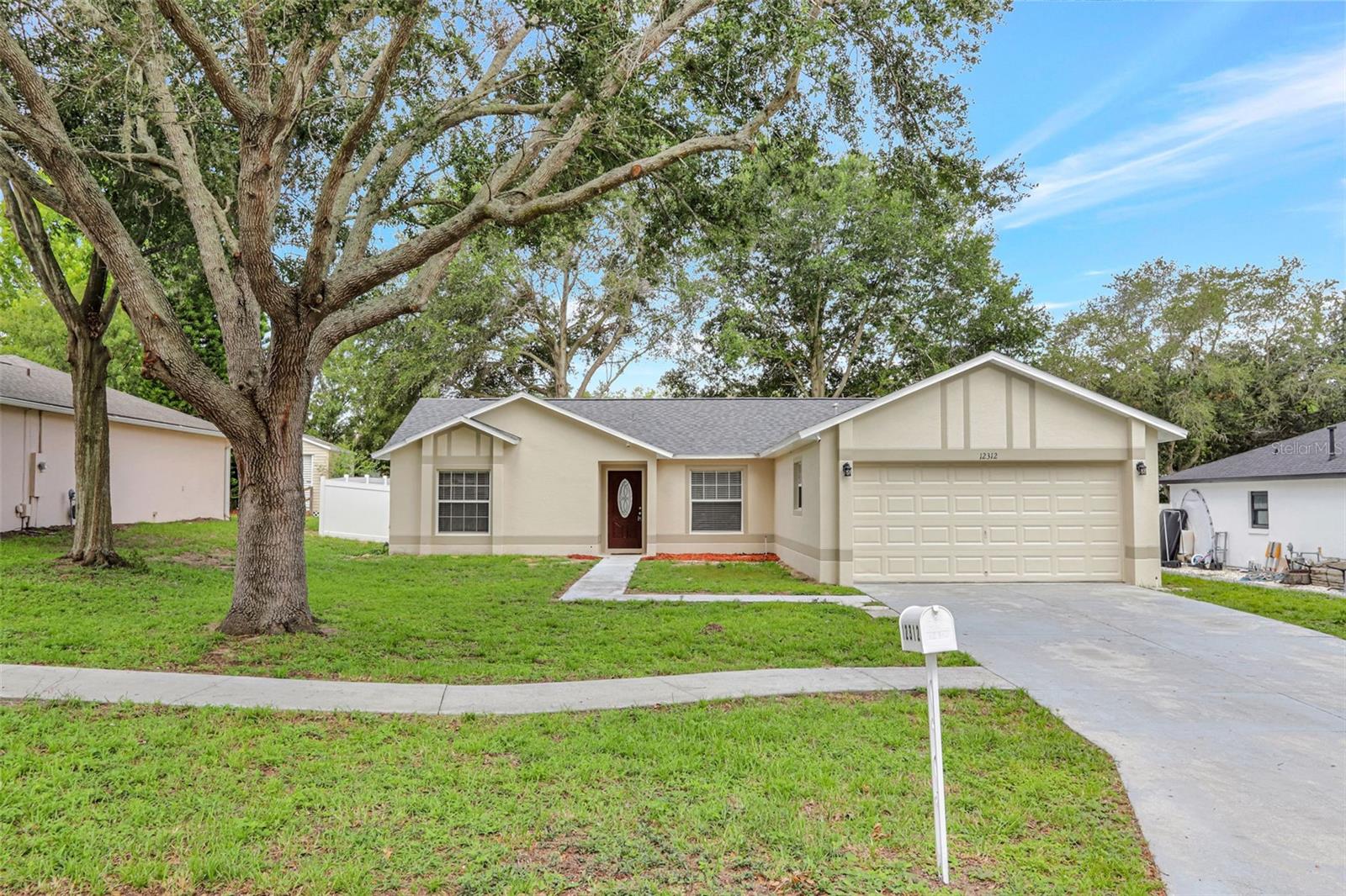 Exceptional single-story 3Bedroom/2Bathroom home located in a desirable Clermont neighborhood. This well-maintained former model features a spacious split floor plan with a living/dining combo overlooking an oversized fenced backyard—perfect for entertaining. The eat-in kitchen offers a pantry, new gas stove, new dishwasher and new garbage disposal. The primary suite includes a walk-in closet, while the two additional bedrooms are privately situated on the opposite side of the home. Recent upgrades include a new roof (installed 5/5/25), new interior/exterior paint, new flooring, and an AC unit replaced in 2020. The garage is outfitted with central air, adding potential for additional heated square footage. Conveniently located near Hwy 27. Move-in ready and waiting to welcome you home!