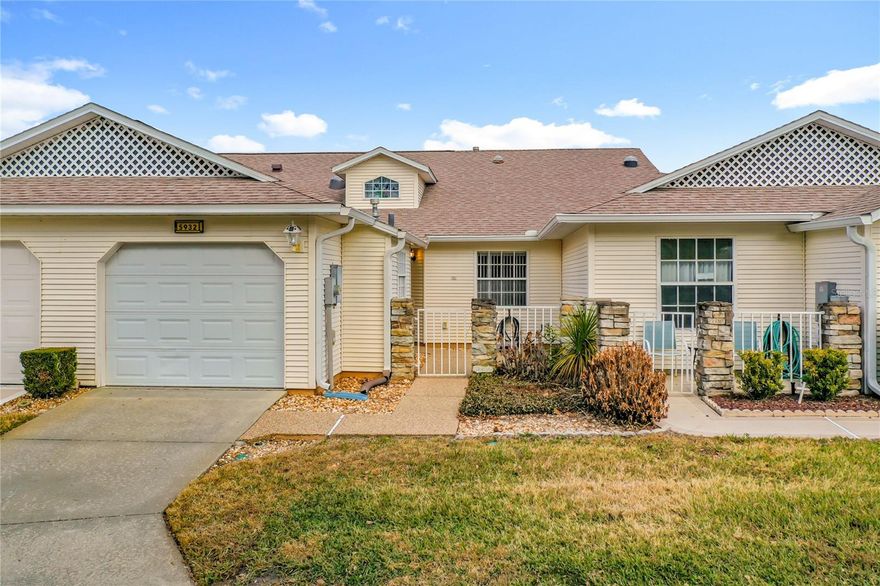 This light-filled 2-bedroom, 2-bath villa offers comfortable Florida living with a private, gated front courtyard ideal for relaxing or entertaining. Updates include a new roof (2022) and a 1-car garage with a remote-controlled retractable screen door. Inside, the open living and dining areas are bright and airy with skylights and solar tubes. A flexible bonus space works well as a den or home office. The open kitchen features ample cabinetry, generous counter space, a pantry, and an eat-in area. The primary suite includes a walk-in closet and an ensuite bath with dual sinks and a walk-in shower with glass enclosure and grab bars. A split-bedroom layout provides guest privacy, with a second full bath accessible from the guest bedroom and hallway. Located in Highland Lakes, a gated 55+ community south of Leesburg, residents enjoy extensive amenities including a clubhouse with indoor and outdoor pools, fitness center, tennis, pickleball, shuffleboard, bocce ball, softball, golf driving range,and RV/boat storage with 260 secured spaces. Homeowners can also join the Craftsman building/woodworking shop club for an additional fee and access a variety of tools. The community also features a nature trail and seven lakes, four of which are available for catch and release fishing. Central Florida offers excellent shopping, amusement parks, state parks, medical and professional services, as well as a wide range of restaurants and entertainment options. Experience the best of retirement living - book your home tour today!