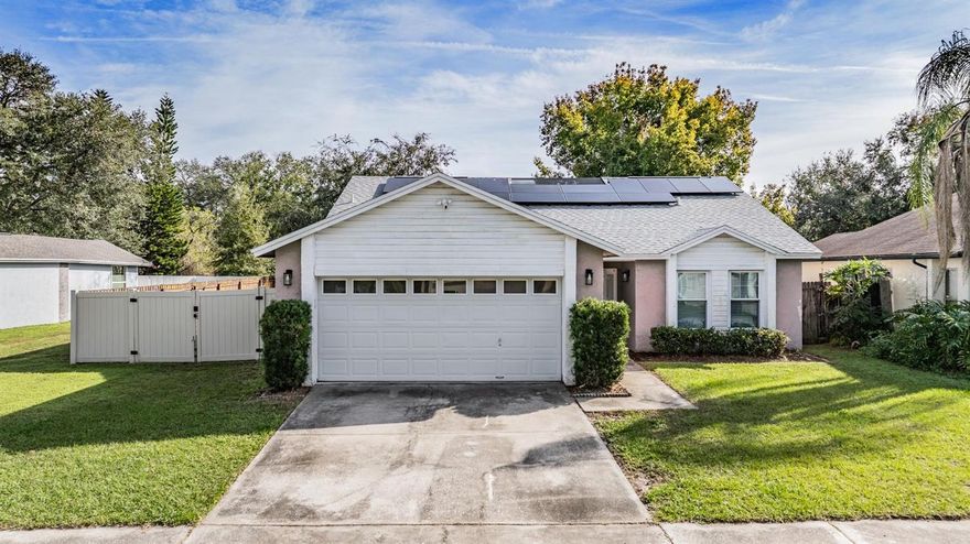 This three bedroom, two bath, home is ready for a new owner.  This home features a split floorplan with a unique screened atrium n the middle.  The open floorplan allows for great flow throughout the main areas of the home.  The kitchen has large cabinets on both sides of the peninsula creating additional space for storage.  From the living room, you can enjoy opening up the sliders to your backyard.  The backyard is has a large patio that is paved, screened, and covered.  Beyond the porch is a oversize lot with no back neighbors.  Have an RV?  No problem, there are large gates on the side of the home to park your RV with either 30 amp or 50 amp service in your side yard.  If you want to bring the outside in, you can do so using the screened atrium for your plants, meditation area, or even make it into an additional siting space.  This atrium area has multiple sliders (even into bedroom 3) which allow for great airflow when opened.  Home also has solar panels for extremely low electric bill.  Conveniently located and NO HOA!  Come check out this home today!