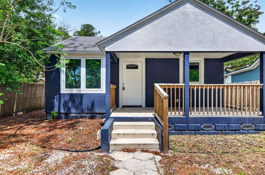 Welcome to this beautifully updated home in St. Petersburg! This charming property features a modern kitchen with white shaker cabinets, quartz countertops, and stainless steel appliances, creating a bright and functional space for everyday living. The home offers updated finishes throughout, including fresh interior and exterior paint and vinyl flooring. The property features newer impact windows for added efficiency and peace of mind.

Enjoy your morning coffee on the inviting covered front porch, complete with new wood railings, or take advantage of the spacious backyard, perfect for entertaining, pets, or future expansion. A detached structure/shed provides additional storage or potential workspace flexibility. A dedicated laundry room at the rear of the home includes a washer and dryer for added convenience.

Conveniently located near downtown St. Petersburg, shopping, dining, and Gulf beaches, this move-in-ready home is a great opportunity for homeowners and investors alike. Schedule your private showings today!