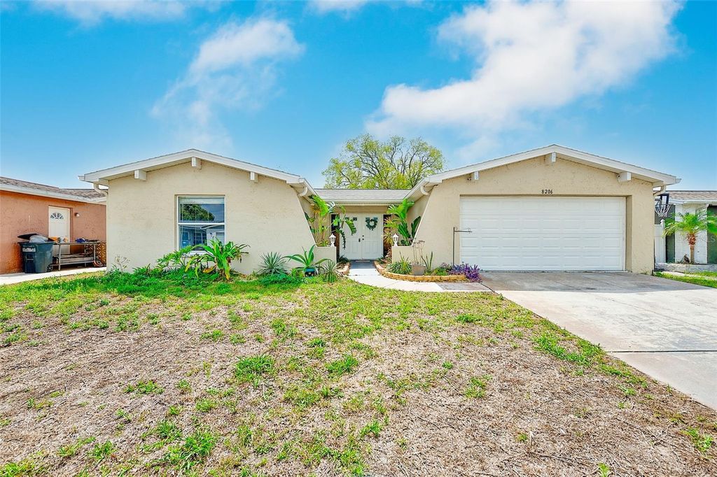 Photo of 8206 Dedham Drive, Port Richey, FL 34668 (MLS # TB8487168)