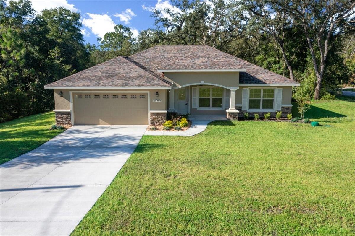 Welcome to 20396 SW 79th Lane, Dunnellon, FL 34431 – Your Peaceful Retreat Awaits!
Nestled on a full acre in a serene and tranquil setting, this stunning home offers the perfect blend of modern comfort and thoughtful design. Step inside to an open-concept layout featuring luxury vinyl plank (LVP) flooring throughout, setting the tone for a clean and cohesive look.
The beautifully appointed kitchen is a chef’s dream, complete with granite countertops, a generous food pantry, accent lighting under the cabinets, and top-quality lighting and ceiling fan fixtures throughout. Whether you're hosting a dinner party or enjoying a quiet night in, the open layout makes entertaining effortless.
The guest bathroom offers a stylish tub/shower combo with floor-to-ceiling tile and a window for natural light. The spacious master suite is a true retreat, featuring elegant tray ceilings, dual vanities with granite counters, a large custom walk-in shower with a rain shower head, and a massive walk-in closet.
Enjoy quiet evenings or weekend gatherings on the oversized back patio, where there’s plenty of room to relax and unwind in the beauty of your surroundings.
Don't miss this incredible opportunity to own a move-in ready home in one of Dunnellon’s most peaceful areas. Schedule your private showing today!