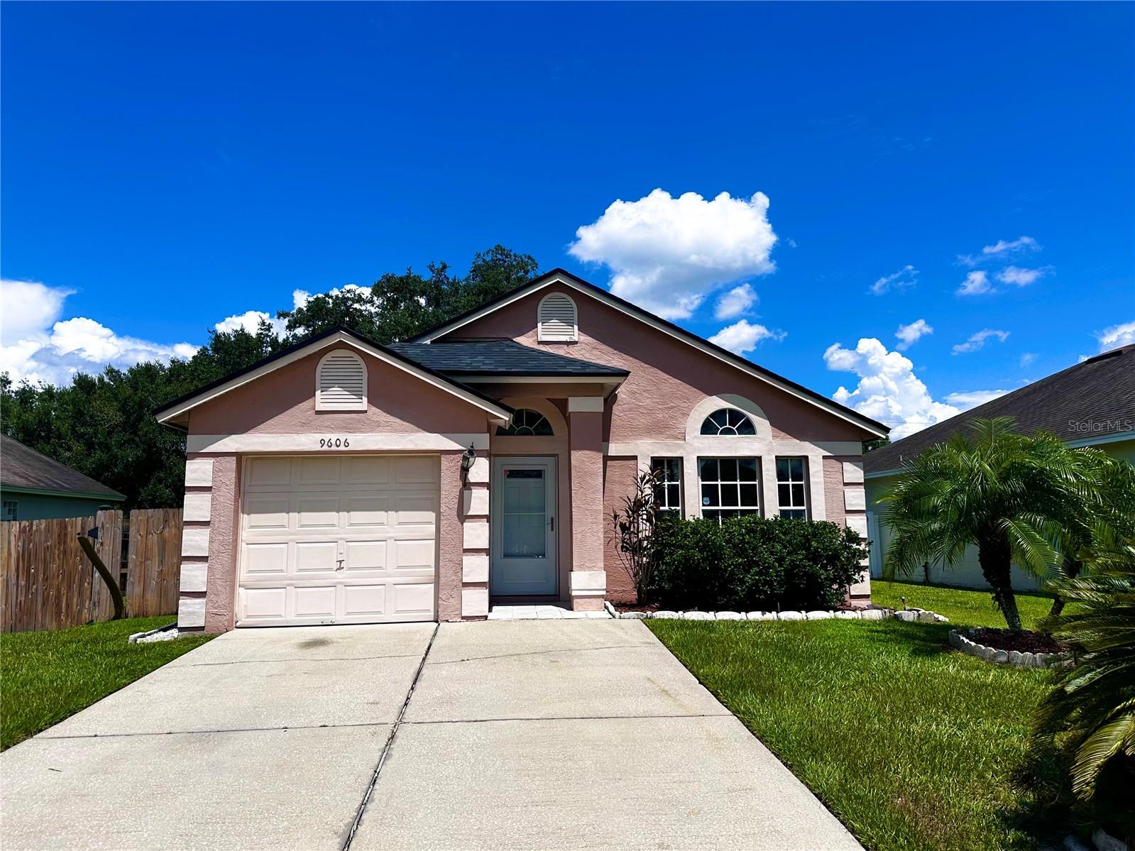 This charming 3-bedroom, 2-bath home with an attached 1-car garage is tucked away in a peaceful East Orlando neighborhood, just minutes from Valencia College, UCF, shopping, dining, and major highways 417, 528 and 408. Featuring ceramic tile throughout for easy maintenance, the home boasts vaulted ceilings and large windows that create an open, airy feel. The central kitchen shines with granite counters, a tile backsplash, rich cappuccino cabinetry, and a pass-through to the living room. The master suite includes a private en-suite bath and walk-in closet, while two additional bedrooms share a second full bath. Enjoy outdoor living with a spacious patio, manicured yard, and storage shed—perfect for barbecues or relaxing in the Florida sunshine. This well-maintained home is move-in ready and a must-see! Act now! This one won't last long! All applicants are required to do a credit and background check. Renters insurance is required.