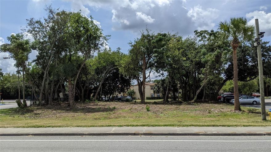 HEAVILY TRAVELED PRIME LOCATION on US 1, - South Dixie freeway, B-3 zoning, in busy corridor of Wendy's, McDonalds and Beef O'Bradys. Located across street from AMC Movie theater, Mc Kenna's Sports Bar, Sherwin Williams paint store and Planet Fitness. Also located within 1/4 mile of an Elementary School. Middle School and High School. Daytona College campus as well. This parcel would be ideal for a drive thru liquor store, coffee shop (see photo of example) fast food or whatever you can imagine. Pizza Hut building next door is also available for purchase, thus increasing possibility for a larger development.