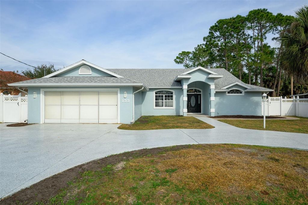 Photo of 133 Wood Haven Drive, Palm Coast, FL 32164 (MLS # FC317887)