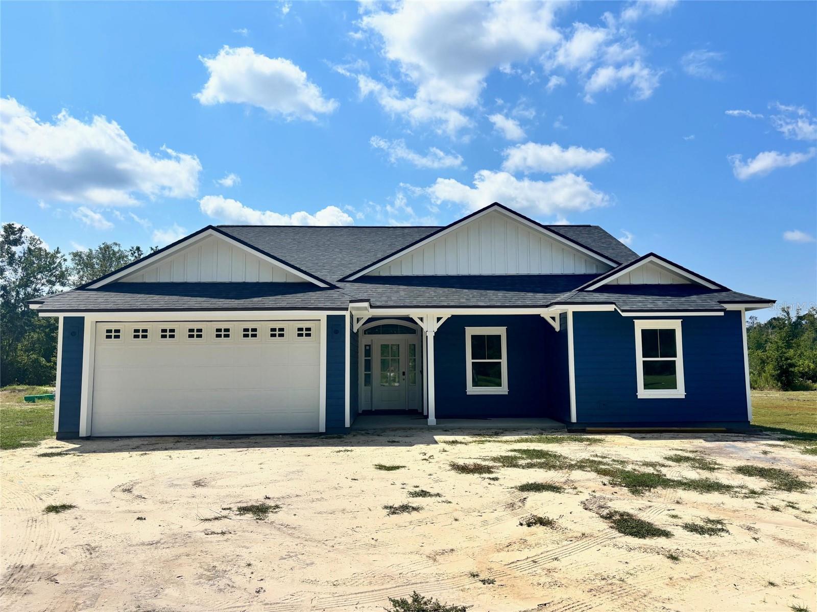 Under Construction. Be the First to Call This Home! This beautiful new construction home sits in the heart of Melrose, FL. This home offers the perfect opportunity to secure your place in a brand-new residence before it's complete. Featuring 4 bedrooms, 2.5 bathrooms. With 1,981 h/c sq ft. Enjoy modern craftsmanship, open-concept layout, and thoughtful design throughout. With construction well underway, now's your chance to customize select finishes and truly make it your own (depending on the build timeline.) Set on a spacious half-acre lot in a peaceful setting, you'll love the blend of country living with easy access to local shops, lakes, and dining. Don't miss this rare chance to own new in the charming Melrose community and in Florida's best lake region!