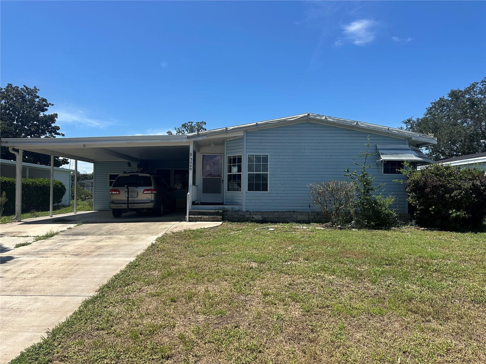 Here is your chance to live in the desirable and highly sought after 55+ Fox Run Community. This community has a tranquil country setting with all the conveniences of city living. The common areas include a clubhouse, two pools, one of which is heated, shuffleboard courts, scenic ponds, and a long scenic boardwalk along our beautiful canal. Fox Run has a marina with spaces for approximately 55 boats, and canal providing access to the Harris Chain of Lakes which is famous for its wonderful fishing, and its connected waterways to each of the 7 lakes. The low monthly HOA fee of just $60 covers our maintenance and insurance of the clubhouse, two pools, two ponds, boardwalk, marina, our park, and all other common grounds within our boundaries. The home sits on a sizable lot with a one car carport for covered parking. The home features 2 bedrooms with 2 full bathrooms and 1376 heated and cooled square feet. There is lots of space in the kitchen with an abundance storage and lots of counter space for meal prep. Call today to schedule a tour and see for yourself what this home has to offer!