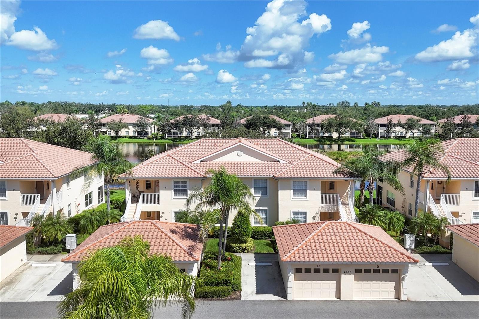 Live the Gulf Coast lifestyle at Casa Di Amici, a stylish second-floor end unit condo in the lovely gated community of Venetia in Venice, Florida. With 1,383 square feet of well-designed living space, this three-bedroom, two-bath home offers a seamless blend of comfort and serenity in a beautiful lakeside setting.
Start your mornings on the private screened lanai with serene water views, or unwind beneath soaring cathedral ceilings in the open-concept living area. The kitchen is thoughtfully equipped with stainless steel appliances (2022), making everyday living and casual entertaining effortless. The split-bedroom layout ensures privacy, with the primary suite featuring a walk-in closet and an en-suite bath with dual vanities. Ceramic tile and vinyl flooring (2018) flow through the main living spaces, while carpet and spa-inspired paint tones in the bedrooms create a soothing, move-in-ready retreat. Recent upgrades include: A/C unit (2024), water heater (2018), laundry room sink (2013), screen door (20l3), lanai tile flooring (2014), outdoor fan (2024), and more, offering comfort, convenience, and peace of mind. Living room, primary bedroom, dinette table and chairs and lanai patio furniture are included with the purchase.
Residents enjoy resort-style amenities including three heated pools, fitness center, clubhouse and courts for tennis, pickleball, basketball and bocce. A one-car garage and additional outdoor parking enhance convenience. Located just four miles from Gulf beaches and minutes from downtown Venice, this residence offers proximity to award-winning golf, dining, shopping and year-round recreation. Schedule your private tour today and see why Casa di Amici residents love the Venetia Community so much!