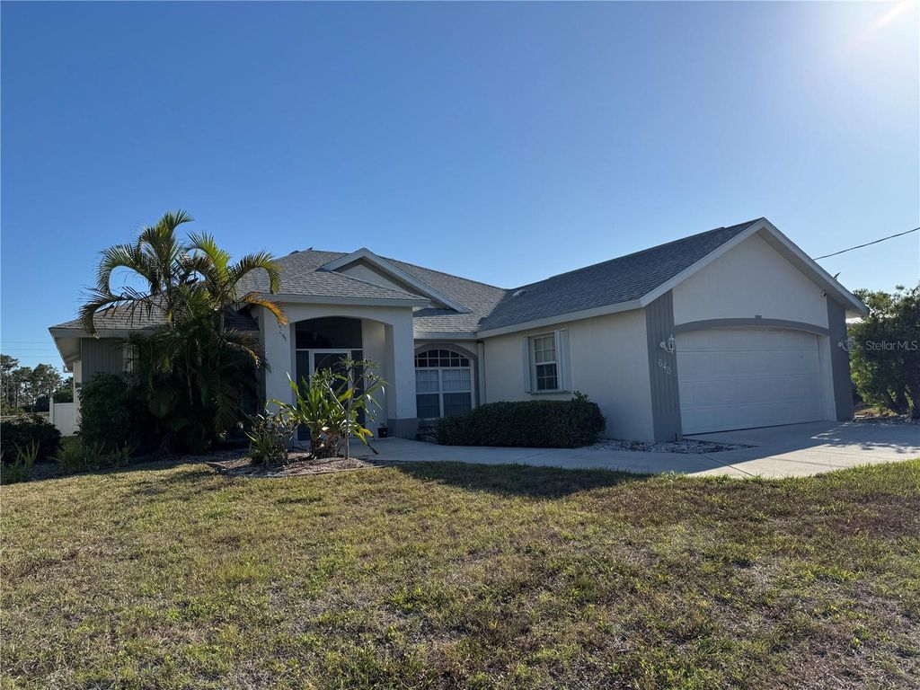 Photo of 640 Boundary Boulevard, Rotonda West, FL 33947 (MLS # D6145080)