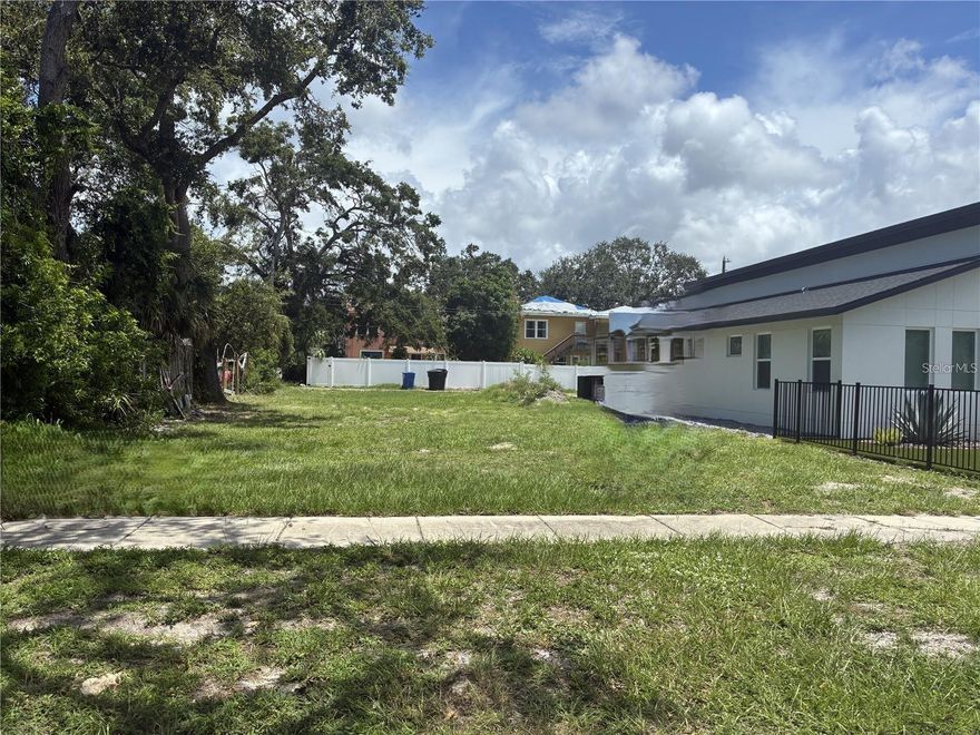 Buildable Lot with Approved Plans! Prime Opportunity! Seize the chance to build your dream home on this 47x112 lot (5,262 SF) located in an established neighborhood and zoned NT-1, which allows for the addition of an Accessory Dwelling Unit (ADU)perfect for guest space, rental income, or multigenerational living. Seller has approved architectural plans that can be included with the purchase, offering a head start on construction and permitting. Nestled beside a stunning 2024 semi-custom home, this lot offers a unique opportunity to create a personalized residence in an area of continued growth and development. Bring your vision to life and take advantage of this ready-to-build lot today! Great location! Just minutes from 5th Ave S taking you to Downtown St. Pete and I-275 S. City of Gulfport is approximately 8 minutes via 49th St