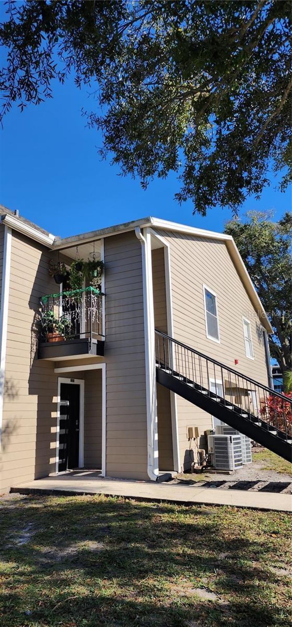 Photo of 4768 Walden Circle #27, Orlando, FL 32811 (MLS # S5144320)