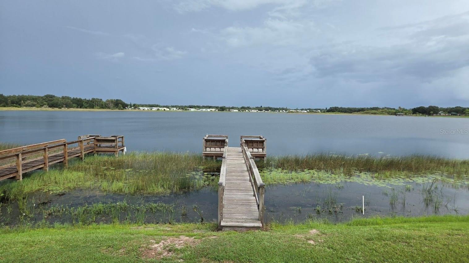 Welcome to SOUTH SHORE RESORT- A PREMIUM 55+ RV Resort Community located on Saddlebag Lake in Lake Wales, FL. This Deeded RV Lot is DIRECT WATERFRONT and has a 65' Dock (built in 2020) and is perfect for relaxing, fishing, boating, canoeing and more! South Shores Resort is a vibrant 55+ community in Lake Wales Florida offering the BEST of Central FL Lake Living. Located on the beautiful Saddlebag Lake, this Resort offers a peaceful, picturesque setting that's hard to find. This RV lot provides ample space for your dream RV setup with AMAZING water views and your own private dock. Enjoy a waterfront pool, clubhouse, fitness center and community dock in this quaint, quiet community. Just a short ride to Bok Tower, Westgate River Ranch Resort & Rodeo, ILE Golf Course, Historic Downtown Lake Wales, shopping, banking, fishing and more!