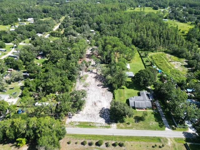Discover the perfect blend of peace, privacy, and potential with this 2.4-acre vacant lot, ideally situated on a quiet dead-end road in the scenic countryside of North Lakeland. The seller has already cleared approximately ¾ of an acre and has started the process on other improvements, giving you a head start on your future plans—whether that means building your dream home, setting up a workshop, or bringing your boats and RVs.
This spacious property features an electric meter already in place, making it easier to begin your build. You'll enjoy the tranquility of rural living without sacrificing convenience, with shopping, dining, top-rated schools, and more just minutes away. Plus, quick access to major highways puts both Tampa and Orlando within easy reach.
Don’t miss your chance to own a slice of Florida paradise in a growing and desirable area—your vision starts here!