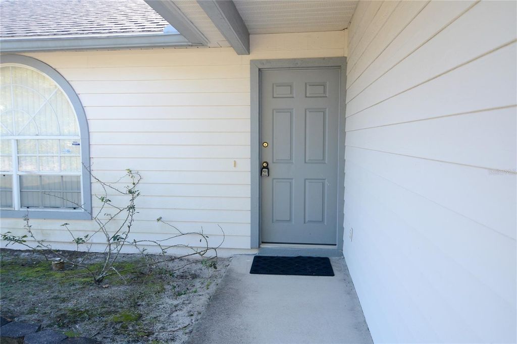 Photo of 925 Elkcam Boulevard, Deltona, FL 32725 (MLS # O6367659)