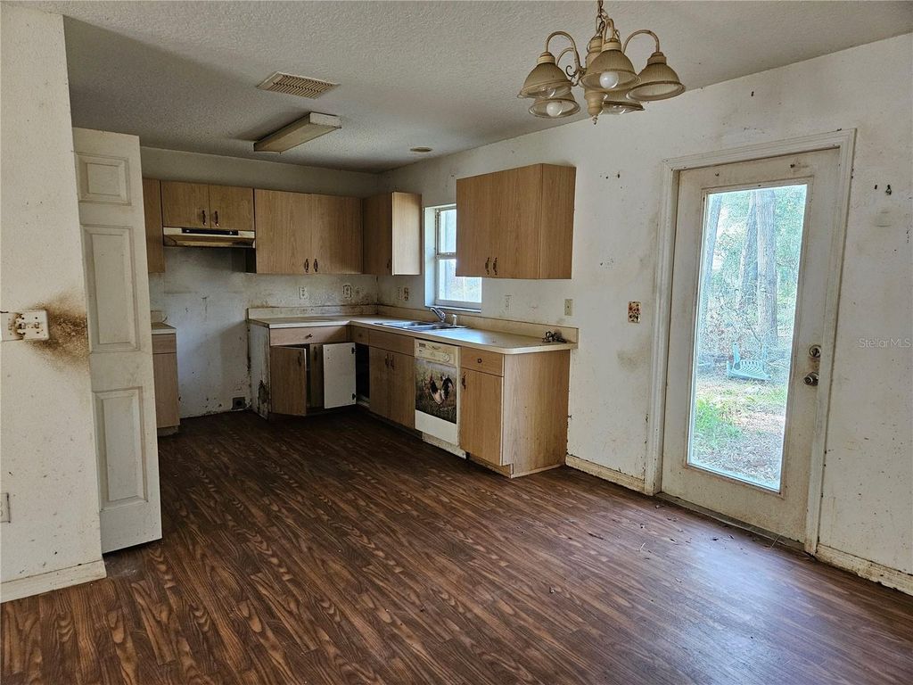 Photo of 5870 SE 158th Court, Ocklawaha, FL 32179 (MLS # OM717737)