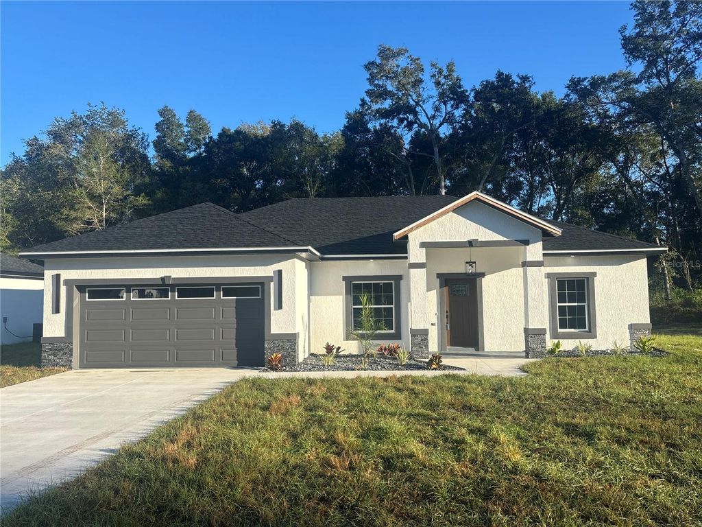 Photo of 2857 SE 142nd Lane, Summerfield, FL 34491 (MLS # OM711586)