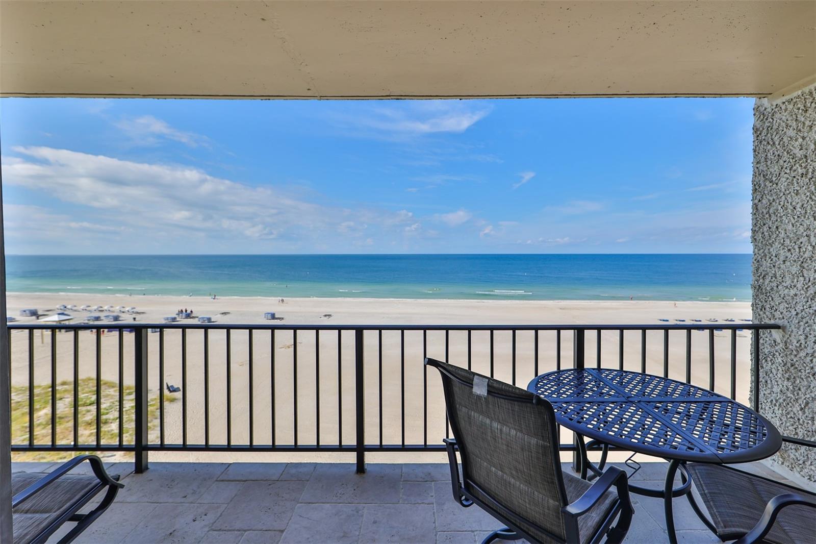 This is a Direct Beach Front Unit - Amazing views from the 6th floor with a full 28 ft balcony directly on the Gulf Of Mexico. Enjoy the sunsets right from your balcony. 3 MONTH MIN. RENTAL! Available starting 04/1/2025. Beautifully decorated 1,300 square foot condo with beach front views in a safe, clean and well-maintained building that sits directly on St. Pete Beach. Just step out the front of the pool area and you are on the most pristine, sandy beaches that you will find anywhere with plenty of water activities. just a short walk on the beach to restaurants, beach bars and the Publix grocery store and other convenient amenities. The property includes a heated pool and deck with plenty of chairs and tables. There is a 54' HD LED TV in living room and 48' LED TV in master w/ DVD Blu Ray. All furniture and beds are top quality, including deluxe dining table with 6 chairs, 6 person sofa, and balcony furniture. Masterfully decorated kitchen with all necessary amenities. Our Non-Smoking condo is located on the 6th floor of an 11-story building and includes magnificent 270-degree views that sweep from the Intra-coastal, to the Don Cesar, to Egmont Key and across the Gulf. All rooms have full Gulf view and balcony! You'll feel right at home with a full kitchen, new refrigerator and dishwasher, free wi-fi internet access, and new closets. Nestled between all the activity of Tradewinds and Sirata Hotels, Seamark captures all the amenities of world class resorts, beach views, resort size pool and deck area right on the beach. The kitchen has been updated to include granite counter tops and stainless-steel appliances. Travertine tile throughout... no carpet anywhere! You will not find a better beach vacation place anywhere else. In 2021, Tripadvisor voted Saint Pete Beach as the number one beach in the United States but was also rated fifth in the world. During peak period, Jan--Mar 2026 rent will be $7,500 per month.