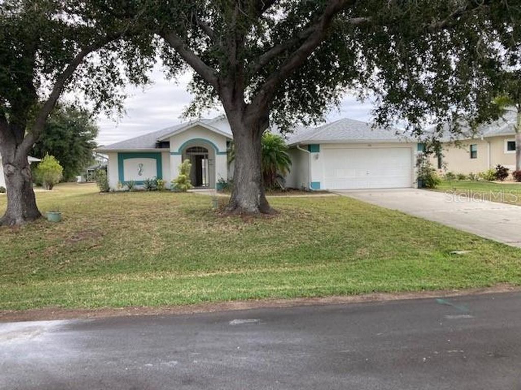 Photo of 136 Long Meadow Lane, Rotonda West, FL 33947 (MLS # O6366276)