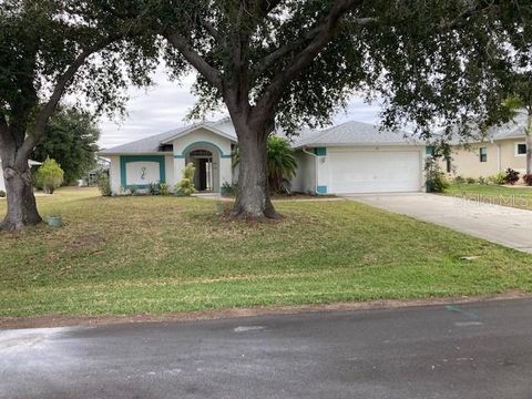 Photo of 136 Long Meadow Lane, Rotonda West, FL 33947 (MLS # O6366276)