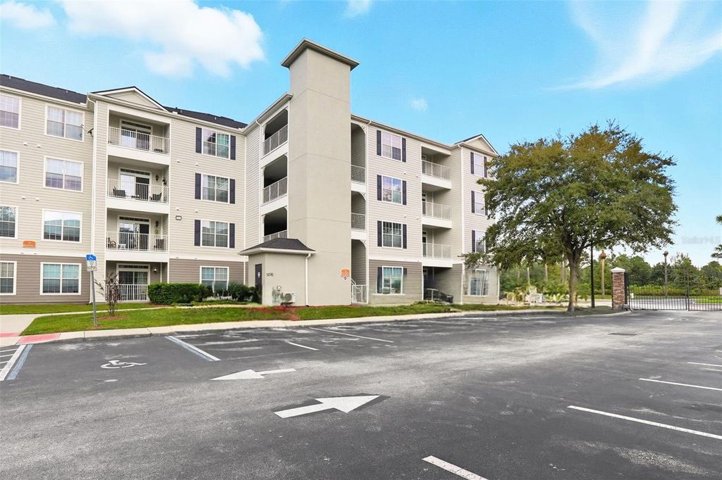 Photo of 3176 Feltrim Place #102, Kissimmee, FL 34747 (MLS # O6351121)