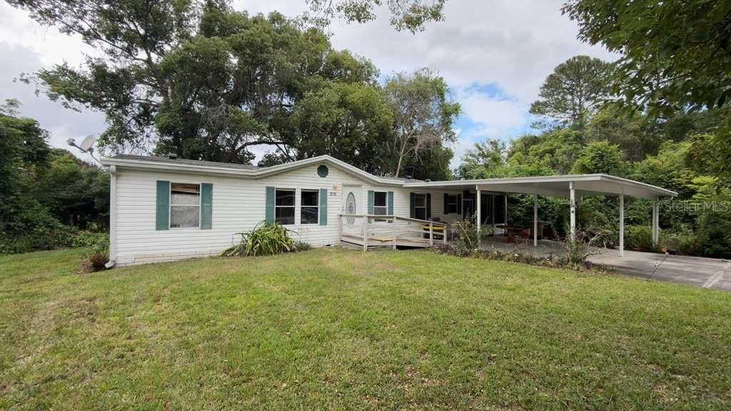 Photo of 2011 Pinewood Lane, Mount Dora, FL 32757 (MLS # O6409316)
