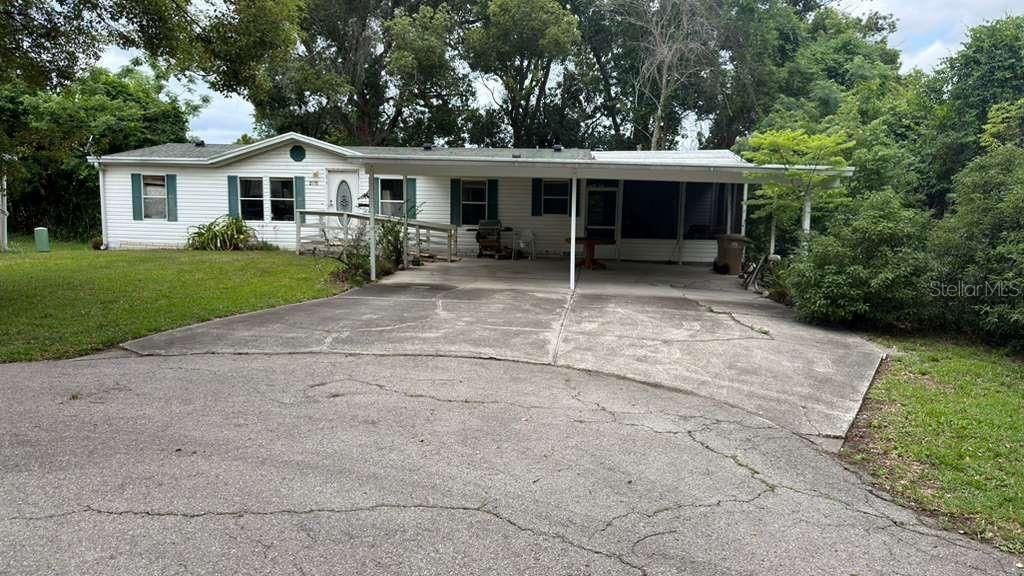 Photo of 2011 Pinewood Lane, Mount Dora, FL 32757 (MLS # O6409316)