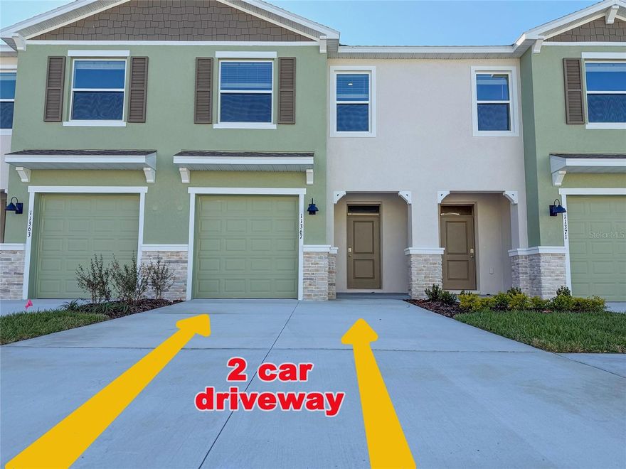 Brand new townhome for you. Just built. In new community of Angeline. At the end of the street, no thru traffic. Big kitchen island. Concrete walls from the ground up all the way to the roof. Well insulated. On conservation lot with a pond view. Community is close to major roads. Only about 40 minutes to Tampa International Airport. In the kitchen all stainless steel appliances. What's unusual for townhomes, there's a huge kitchen island, Ideal for having breakfast there. Three panel sliding doors to the back yard. All 3 bedrooms and 2 bathrooms upstairs. Third bathroom on the main floor. Attached 1 car garage and a great convenience for occupants is that there's a wide driveway to fit 2 cars. Community pool. In the community there's a new school open since August of 2023, The Angeline Academy of Innovation STEM (Science, Technology, Engineering and Mathematics) school is newly open, providing a school within the neighborhood. Angeline is the home of a state-of-the-art global innovation district focused on life sciences. Make an appointment to see it and you'll love it. It may be the next place you will call Home.