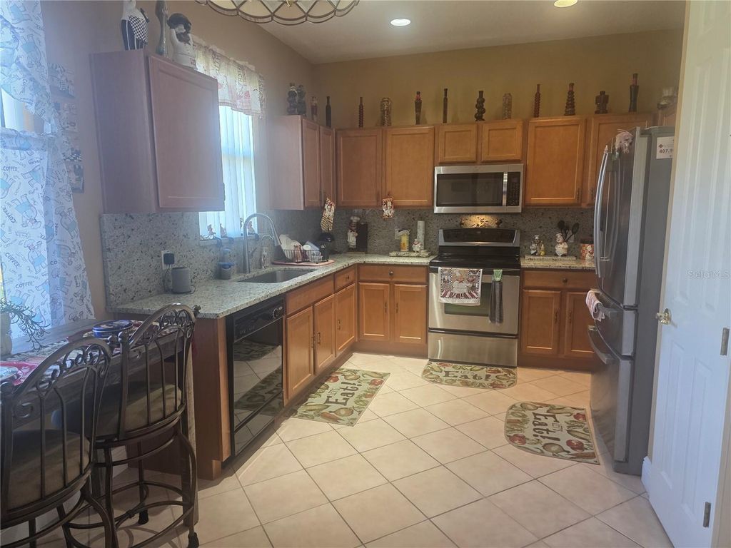 Photo of 328 Indian Wells Avenue, Poinciana, FL 34759 (MLS # S5136972)