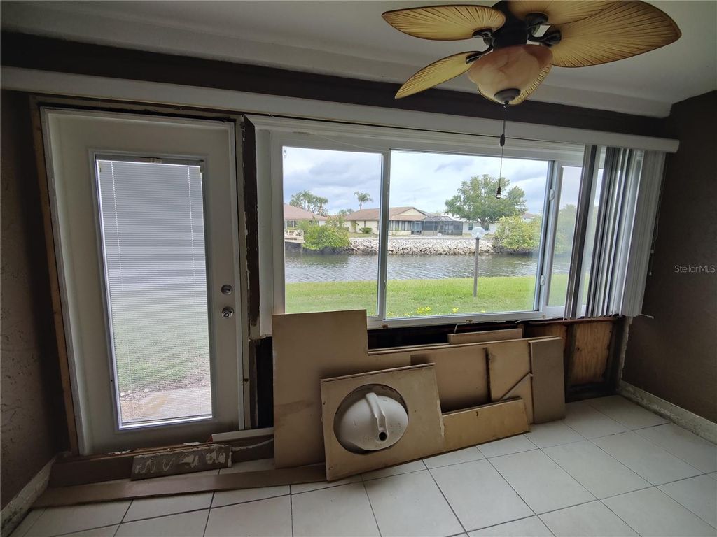 Photo of 4555 Marine Parkway #102, New Port Richey, FL 34652 (MLS # W7870896)