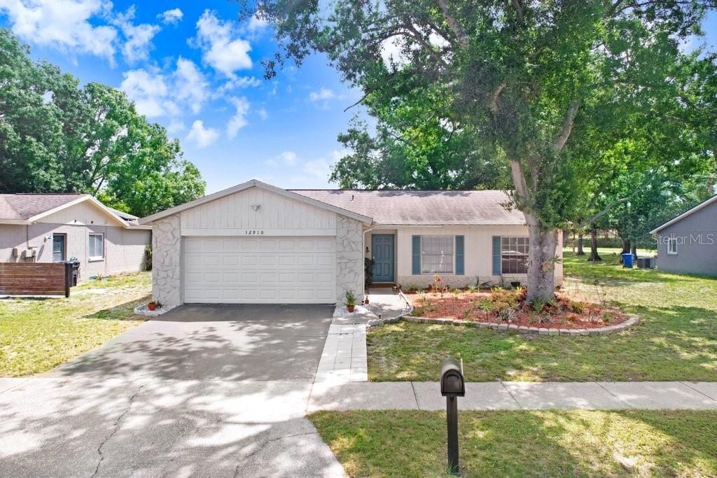 Photo of 12910 Leadwood Drive, Riverview, FL 33579 (MLS # TB8390156)