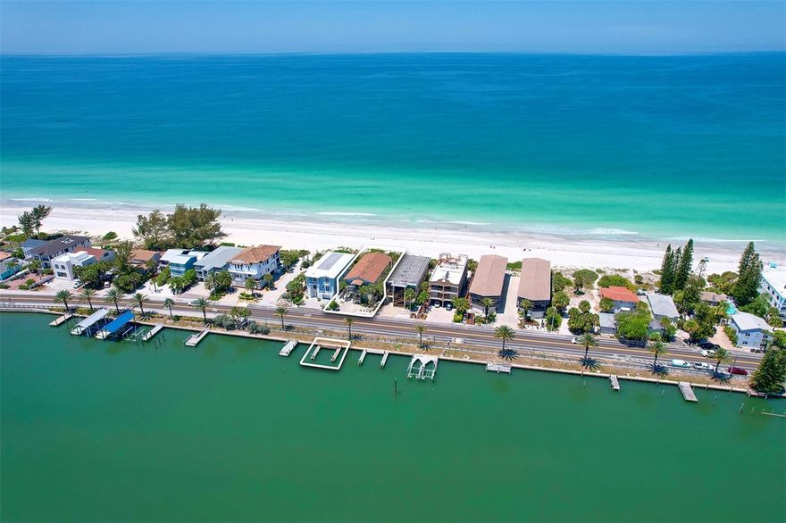An Amazing and Rare Opportunity to Own and Control All 4 Beach Front Condos at Four Gulf Blvd on the Narrows in Indian Rocks Beach with Boat Docks on the Inracoastal with Riparian Ownership Rights. The building sits on a 50 foot wide by 205 foot deep beach front lot.  Each condo is a 2 bed 2 bath 1,100 square foot unit with a beach side balcony overlooking the Gulf as well as Intracoastal facing balconies.  The panoramic water views on both side are epic breathtaking experiences for sunrises and sunsets. There are 8 parking spaces under the building with 1 guest parking space in front of the building.  The boat dock directly across Gulf Blvd. from the building has 4 boat slips. There is NO condominium association or fees, and NO rental restrictions.  This is also an excellent redevelopment opportunity for multifamily or large single family home.  Recent sales of new single family homes just 8 properties to the North of this location just in the $10 million range. Special note: the owners did not relinquished their easement property rights associated with the beach nourishment on the Gulf side of the property. They have retained their property rights Westward of the seawall.  Don’t miss this spectacular opportunity!