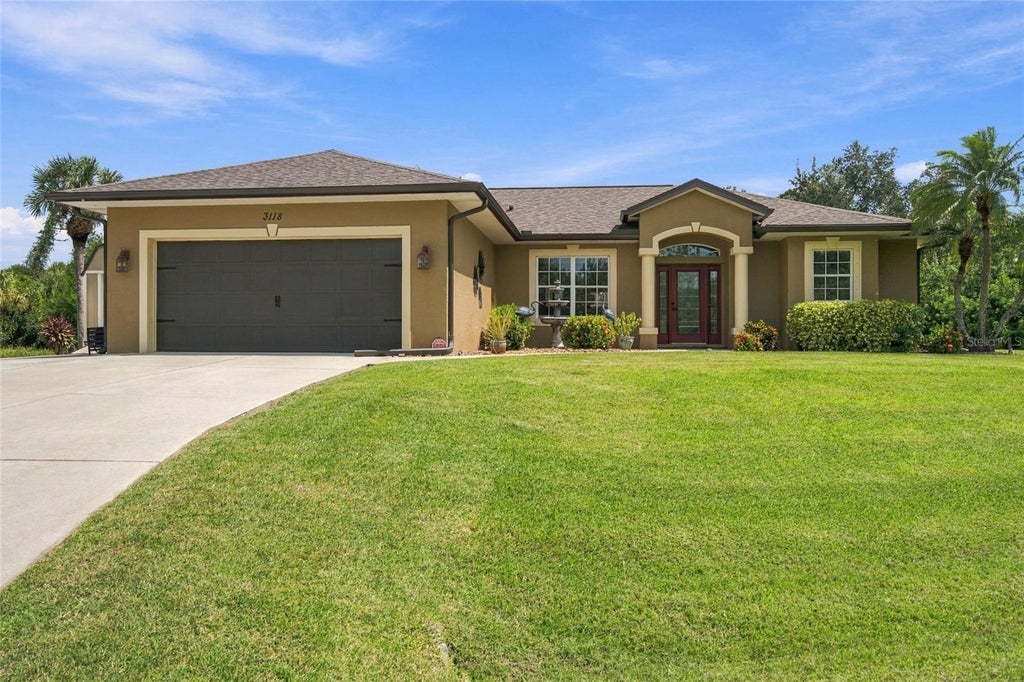 Photo of 3118 Ridgewood Drive, North Port, FL 34287 (MLS # TB8554004)